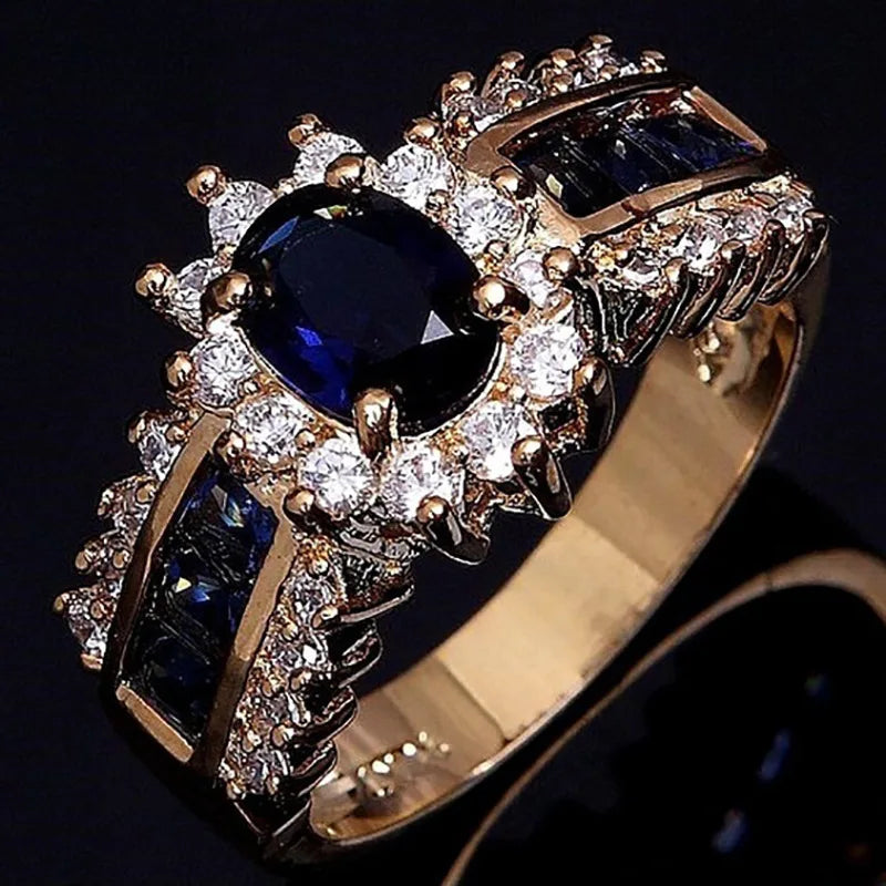 2024 new Luxurious Blue Red Zircon Fashion Men's and Women's Rings Gold Color Anniversary Unisex Jewelry Wedding Rings Wholesale