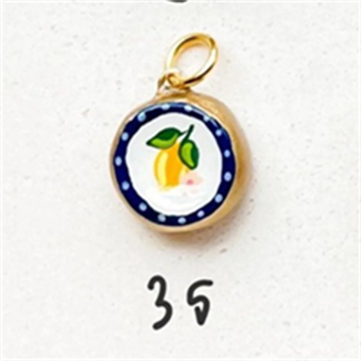 Colorful dopamine pendant with oil droplets, strawberry, crab, heart, shell pattern, color preservation