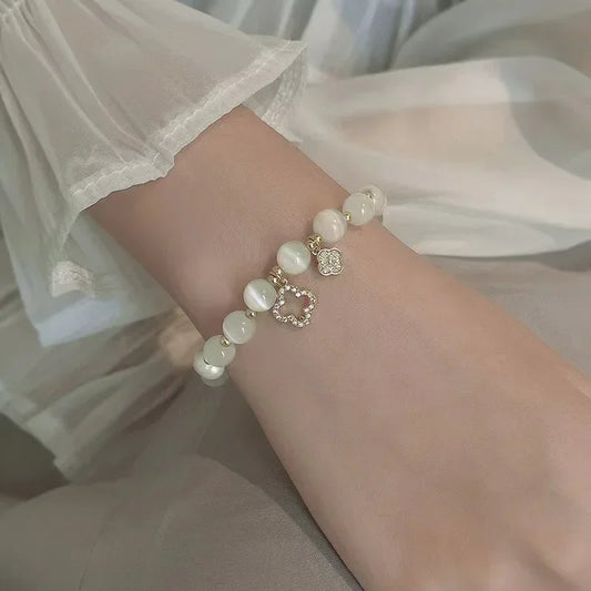 New Bracelet Women's Lucky Four-Leaf Flower Crystal Bracelet Elastic Rope Pearl Transfer Bead Hand Chain Jewelry Bangles Gift
