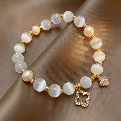 New Bracelet Women's Lucky Four-Leaf Flower Crystal Bracelet Elastic Rope Pearl Transfer Bead Hand Chain Jewelry Bangles Gift