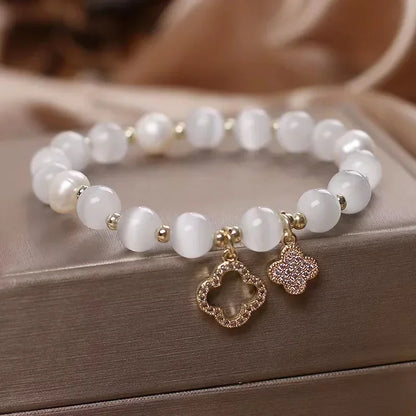 New Bracelet Women's Lucky Four-Leaf Flower Crystal Bracelet Elastic Rope Pearl Transfer Bead Hand Chain Jewelry Bangles Gift