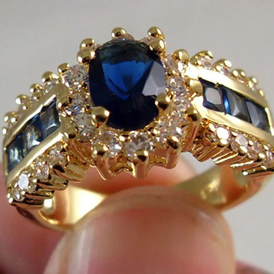 2024 new Luxurious Blue Red Zircon Fashion Men's and Women's Rings Gold Color Anniversary Unisex Jewelry Wedding Rings Wholesale